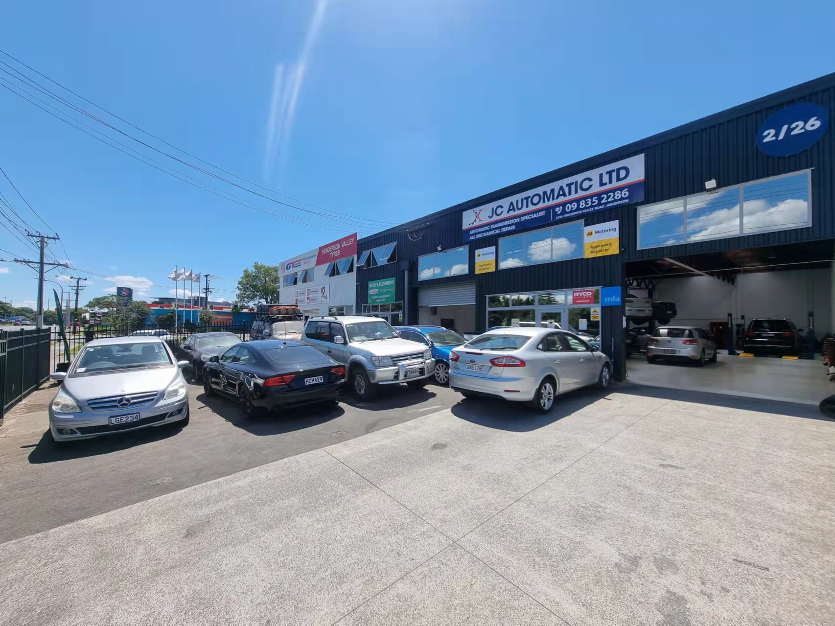 cars on-hoists-resize.jpeg