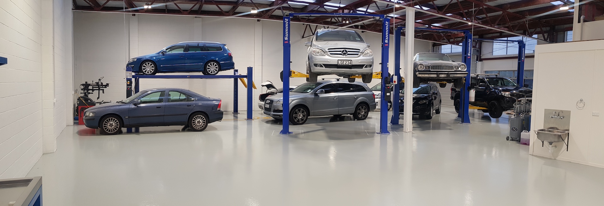 cars on-hoists-resize.jpeg